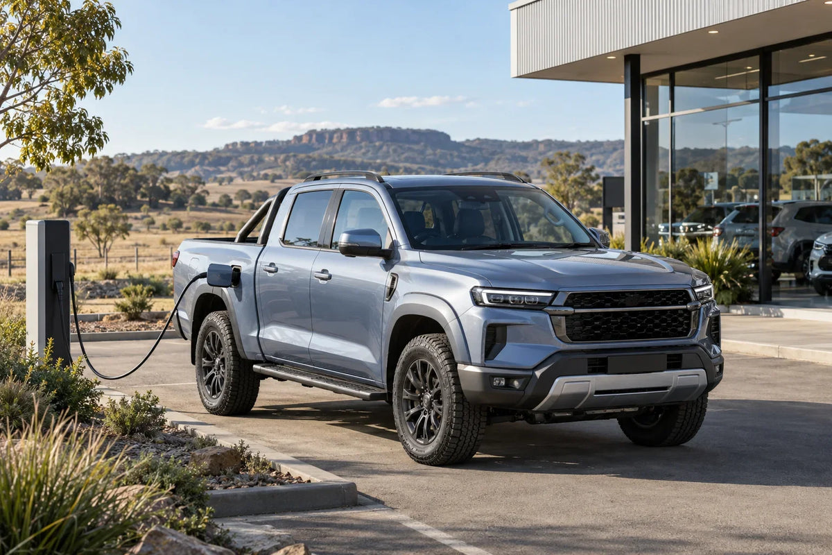 Generic AI concept of an unbranded plug-in hybrid dual-cab ute at an Australian showroom charger; not a GWM vehicle or actual dealership photograph