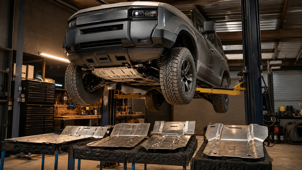 Tank 300 bash plate options arranged for workshop fitment inspection